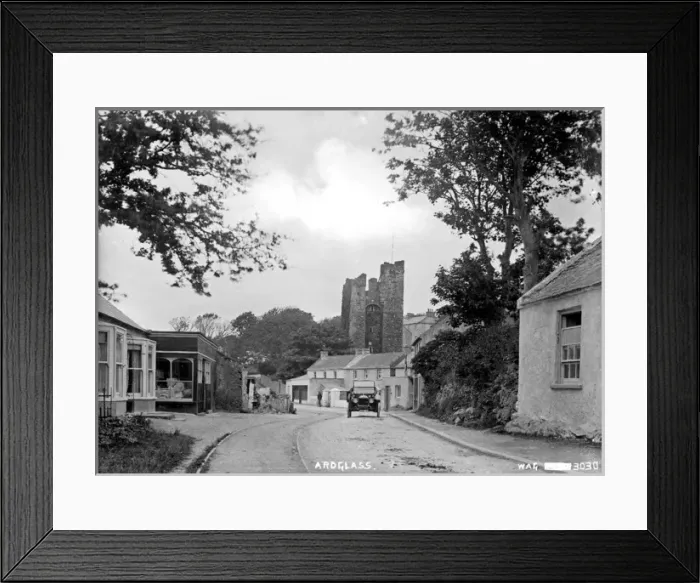 Framed Print : Ardglass - a view of the town looking up to the Castle with a motor car on the road Framed Print : Ardglass - a view of the town looking up to the Castle with a motor car on the road