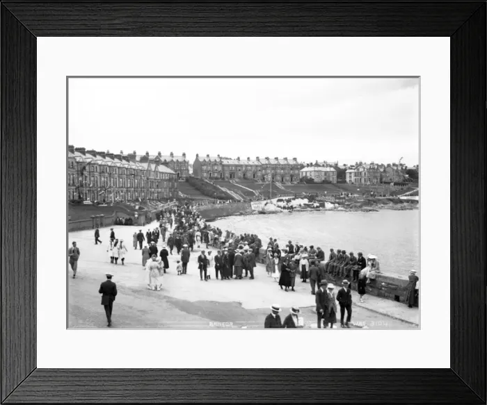 Framed Print : Bangor - a very busy view of people sitting on the sea wall towards Lenaghans Boats Framed Print : Bangor - a very busy view of people sitting on the sea wall towards Lenaghans Boats