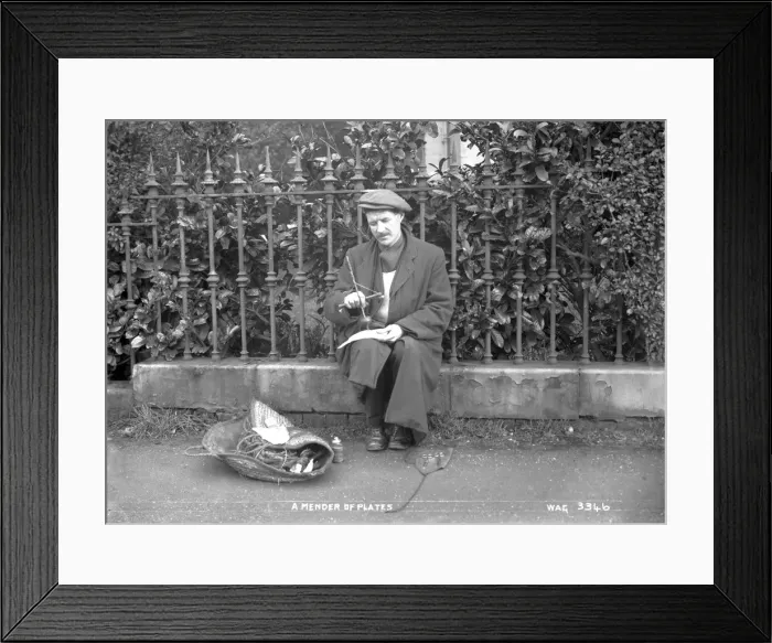 Framed Print : A Mender of Plates Framed Print : A Mender of Plates
