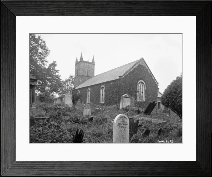 Framed Print : A low view of a Church from the graveyard Framed Print : A low view of a Church from the graveyard