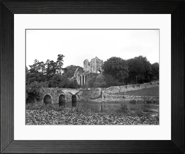 Framed Print : View of a stone arched bridge and ruined Abbey behind Framed Print : View of a stone arched bridge and ruined Abbey behind