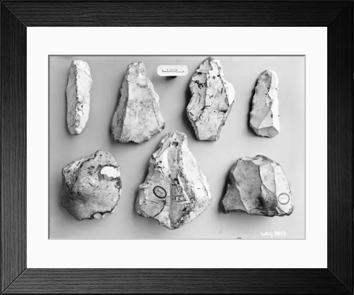 Framed Print : A view of small flints on a grey background Framed Print : A view of small flints on a grey background