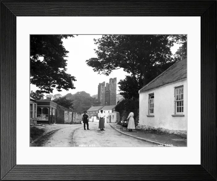 Framed Print : Ardglass - a view on the Main road looking towards the Castle with three Framed Print : Ardglass - a view on the Main road looking towards the Castle with three