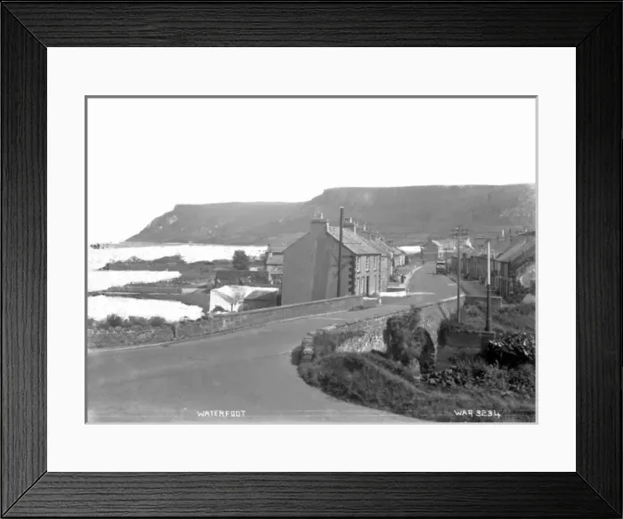 Framed Print : Waterfoot - a view of the town with a stone road bridge in the foreground Framed Print : Waterfoot - a view of the town with a stone road bridge in the foreground