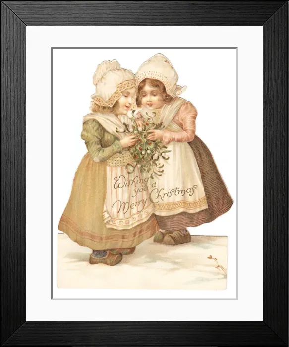 Framed Print : Two Dutch girls on a cutout Christmas card Framed Print : Two Dutch girls on a cutout Christmas card