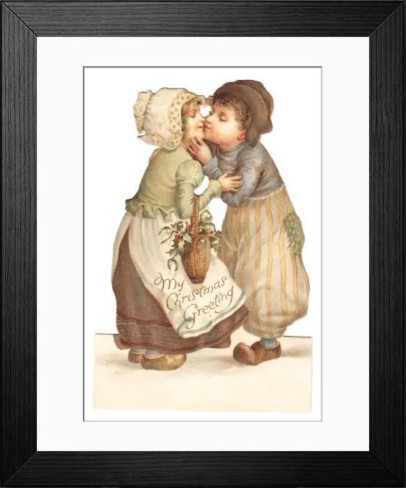 Framed Print : Dutch girl and boy kissing on a cutout Christmas card Framed Print : Dutch girl and boy kissing on a cutout Christmas card