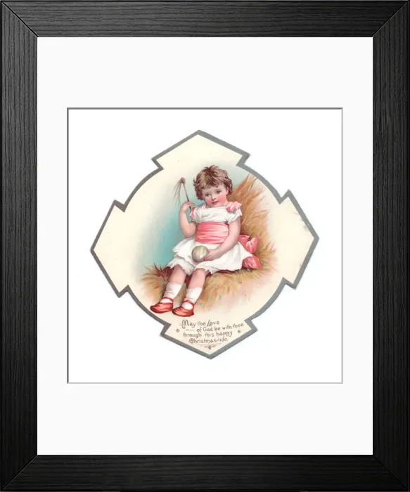 Framed Print : Little girl with ball on a medallion-shaped Christmas card Framed Print : Little girl with ball on a medallion-shaped Christmas card