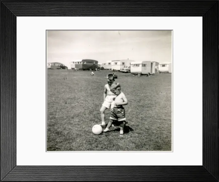 Framed Print : Young brothers playing with ball at a holiday camp Framed Print : Young brothers playing with ball at a holiday camp