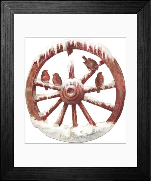 Framed Print : Robins perched on a wheel on a cutout Christmas card