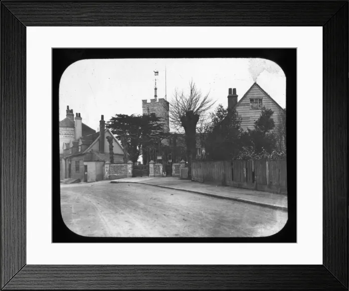 Framed Print : Barnett - View along road, houses and church Framed Print : Barnett - View along road, houses and church