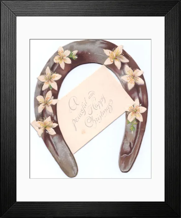 Framed Print : White flowers on a horseshoe-shaped Christmas card Framed Print : White flowers on a horseshoe-shaped Christmas card