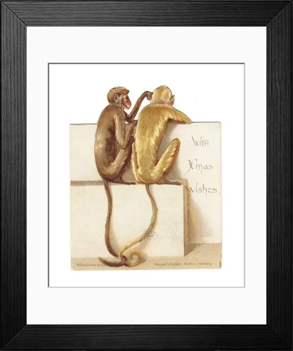 Framed Print : Two monkeys on a cutout Christmas card Framed Print : Two monkeys on a cutout Christmas card