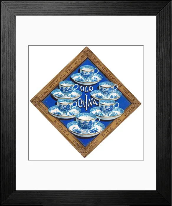 Framed Print : Blue and white china cups and saucers on a Christmas card Framed Print : Blue and white china cups and saucers on a Christmas card