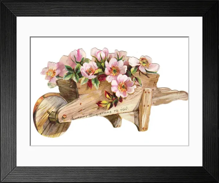 Framed Print : Pink flowers in a wheelbarrow on a cutout Christmas card Framed Print : Pink flowers in a wheelbarrow on a cutout Christmas card