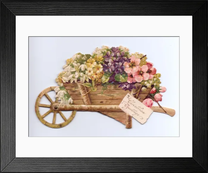 Framed Print : Flowers in a wheelbarrow on a cutout Christmas card Framed Print : Flowers in a wheelbarrow on a cutout Christmas card