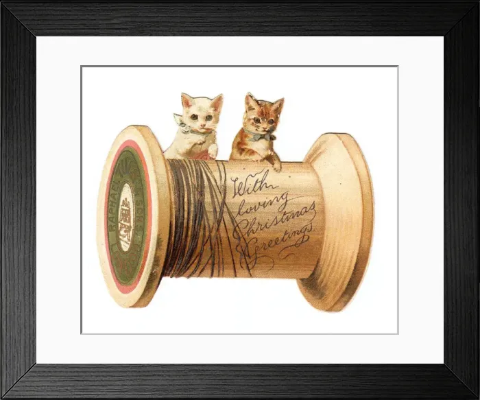 Framed Print : Two kittens with cotton reel on a cutout Christmas card Framed Print : Two kittens with cotton reel on a cutout Christmas card