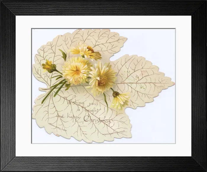 Framed Print : Christmas card in the shape of a white leaf with flowers Framed Print : Christmas card in the shape of a white leaf with flowers