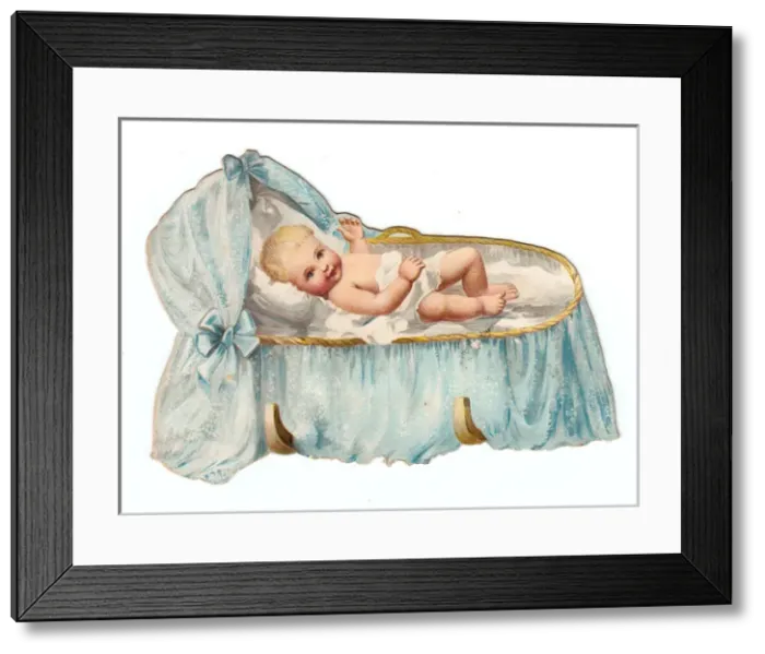 Framed Print : Baby in a cradle on a cutout greetings card Framed Print : Baby in a cradle on a cutout greetings card