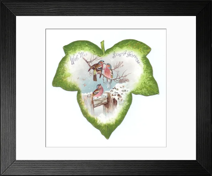 Framed Print : Christmas card in the shape of a green leaf with birds Framed Print : Christmas card in the shape of a green leaf with birds