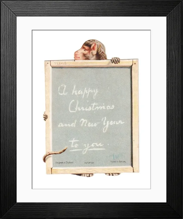 Framed Print : Monkey holding a slate on a cutout Christmas card Framed Print : Monkey holding a slate on a cutout Christmas card