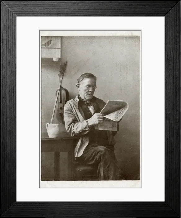 Framed Print : A musician takes a break to read Tit-Bits Framed Print : A musician takes a break to read Tit-Bits
