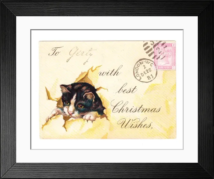 Framed Print : Kitten with envelope on a Christmas card Framed Print : Kitten with envelope on a Christmas card