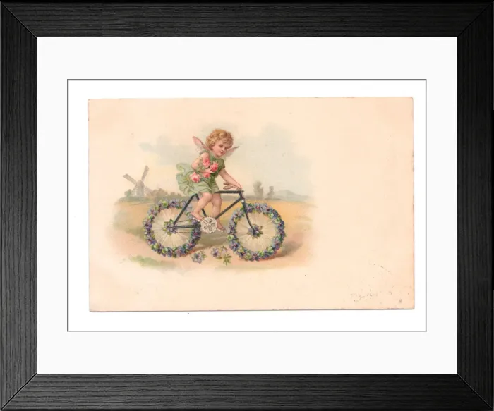 Framed Print : Fairy riding a bicycle on a greetings postcard Framed Print : Fairy riding a bicycle on a greetings postcard