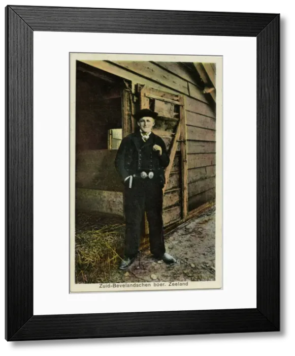 Framed Print : The Netherlands - Dutch Farmer outside his barn Framed Print : The Netherlands - Dutch Farmer outside his barn