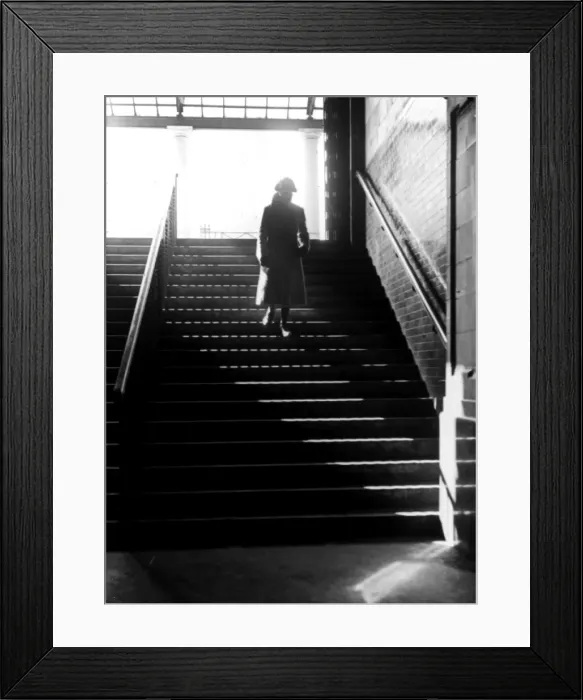 Framed Print : Figure walking down steps Framed Print : Figure walking down steps