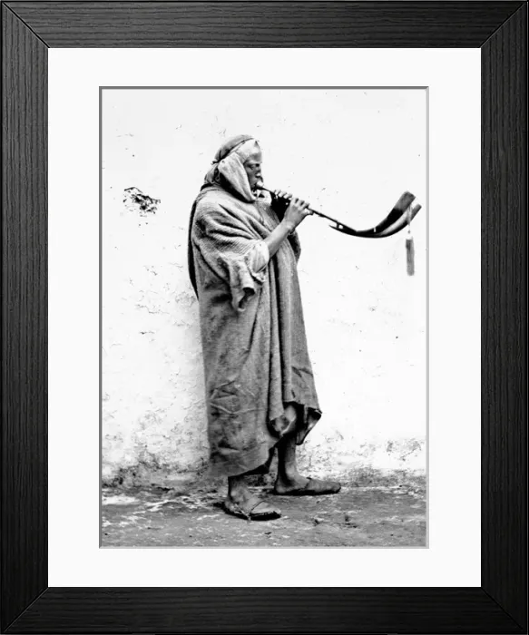 Framed Print : Moorish Musician playing a horn