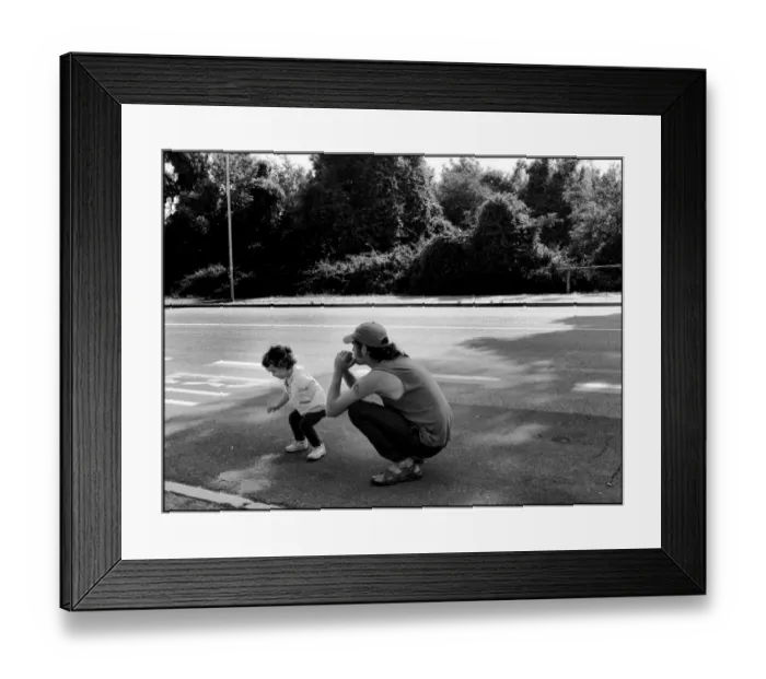 Framed Print : Little girl and her father waiting for bus Italy Framed Print : Little girl and her father waiting for bus Italy