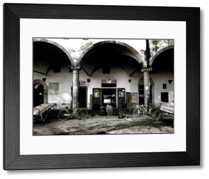 Framed Print : Two bikes in piazza Pisa Italy Framed Print : Two bikes in piazza Pisa Italy