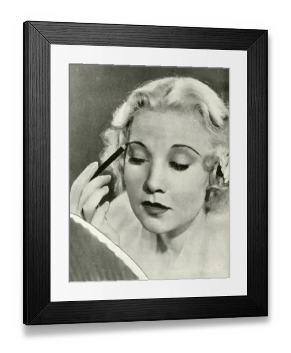 Framed Print : Una Merkel, MGM star, applying Max Factor make up Framed Print : Una Merkel, MGM star, applying Max Factor make up