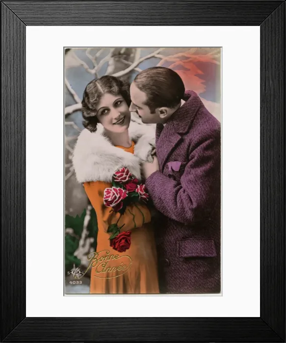 Framed Print : Kitsch New Years Greetings postcard featuring a young couple Framed Print : Kitsch New Years Greetings postcard featuring a young couple