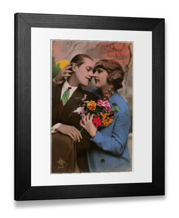 Framed Print : Kitsch New Years Greetings postcard featuring a young couple Framed Print : Kitsch New Years Greetings postcard featuring a young couple
