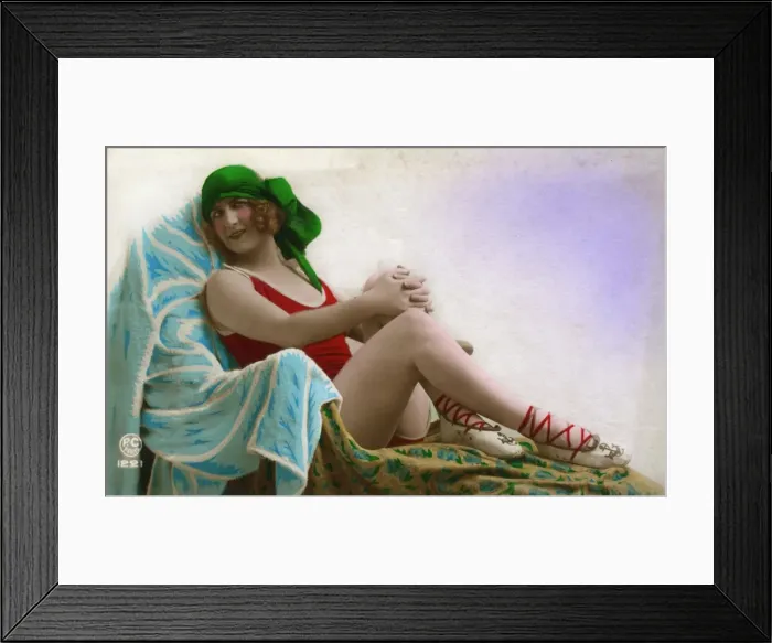 Framed Print : Bathing beauty reclining on a couch