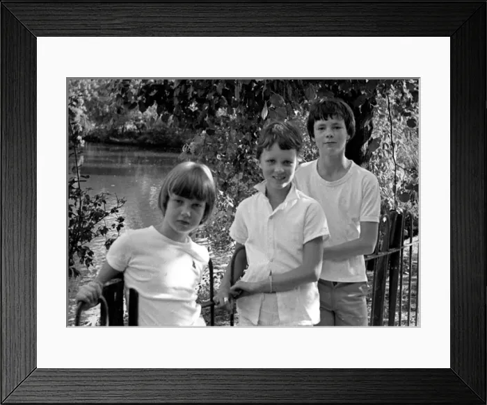 Framed Print : Three teenage children, a brother and his two sisters