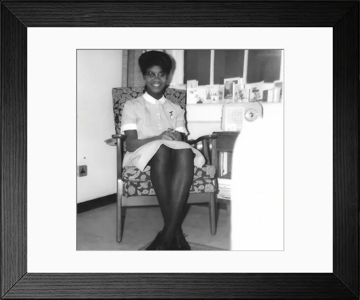 Framed Print : Black student nurse sitting in her room in Nottingham Framed Print : Black student nurse sitting in her room in Nottingham