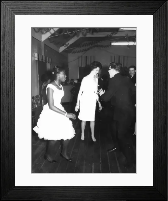 Framed Print : Black lady dancing in white peplum dress in Nottingham Framed Print : Black lady dancing in white peplum dress in Nottingham