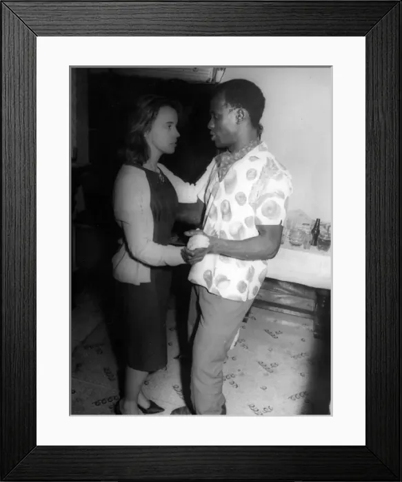 Framed Print : African man and English woman on the dance floor at a party Framed Print : African man and English woman on the dance floor at a party