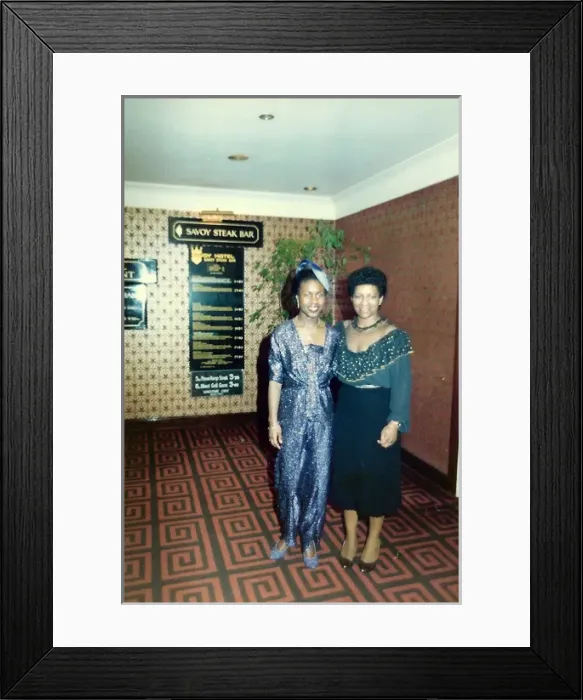 Framed Print : Two British Caribbean women standing in a restaurant in Nott Framed Print : Two British Caribbean women standing in a restaurant in Nott
