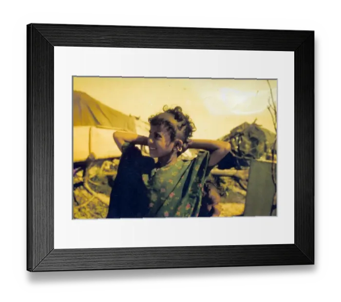Framed Print : Omani girl smiling in Oman Framed Print : Omani girl smiling in Oman