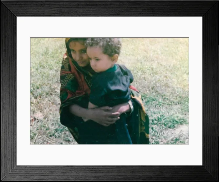Framed Print : Omani girl and a young boy in Oman Framed Print : Omani girl and a young boy in Oman