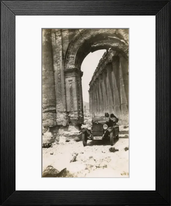 Framed Print : European Gentleman driven Triumphal Arch, Palmyra, Syria Framed Print : European Gentleman driven Triumphal Arch, Palmyra, Syria