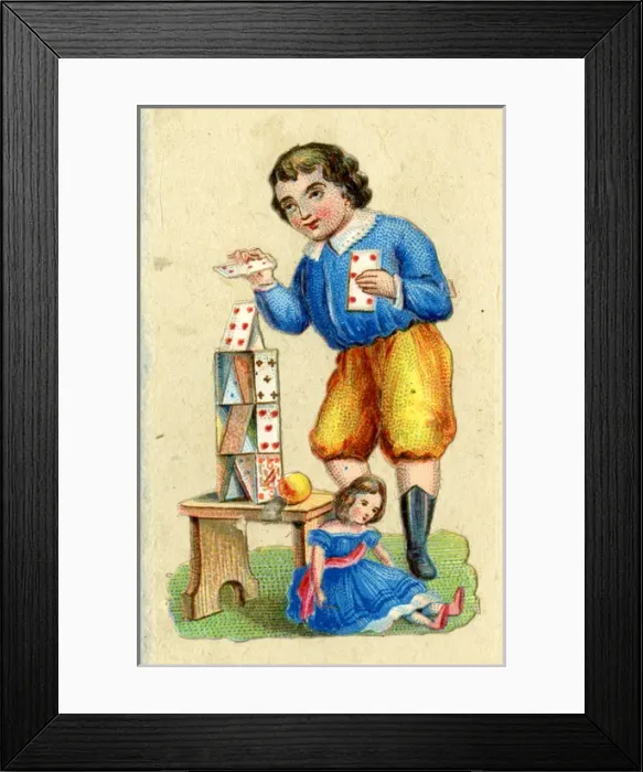 Framed Print : Scrap - boy building house of cards Framed Print : Scrap - boy building house of cards