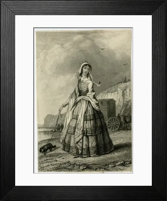 Framed Print : Woman walking her dog on the beach Framed Print : Woman walking her dog on the beach