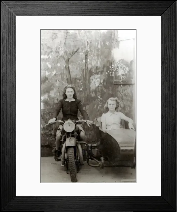 Framed Print : Two ladies in studio on a 1931 / 2 Raleigh motorcycle Framed Print : Two ladies in studio on a 1931 / 2 Raleigh motorcycle