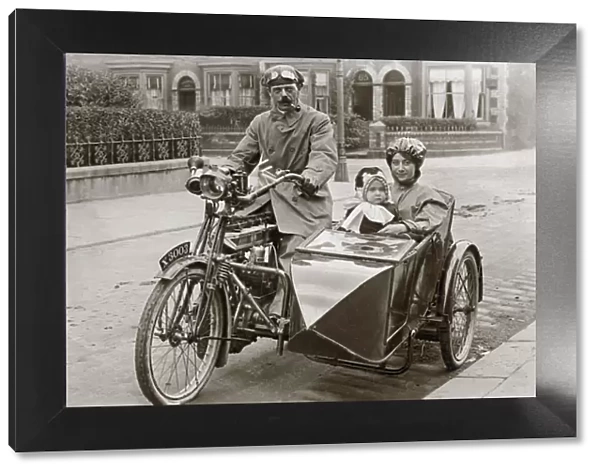 Family on a 1906 motorcycle & sidecar