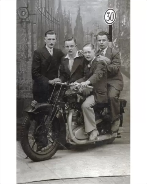 Young men on 1920s Coventry Eagle motorcycle