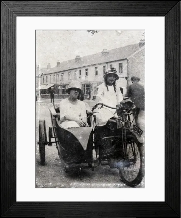 Framed Print : Two ladies on veteran motorcycle combination in street Framed Print : Two ladies on veteran motorcycle combination in street